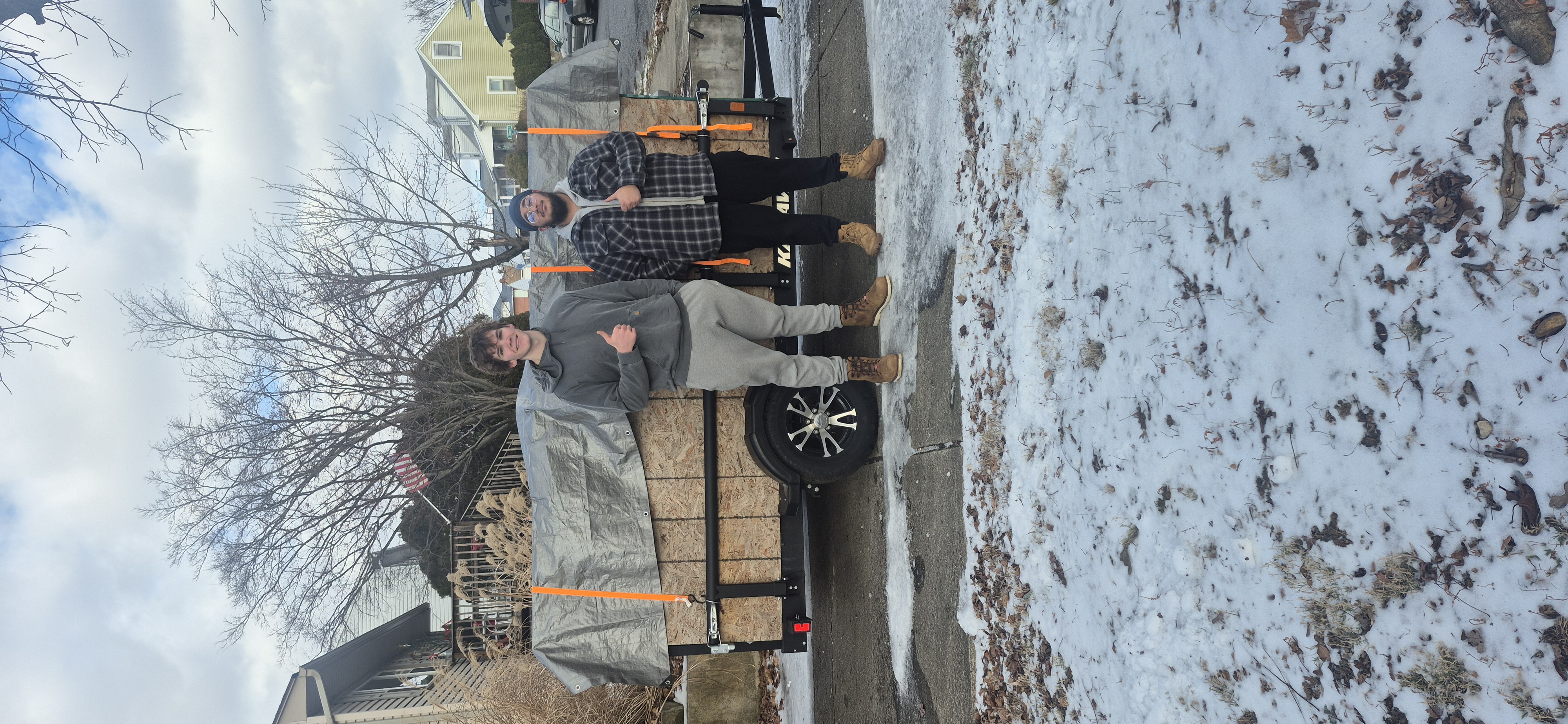 HS Hauling team with customer